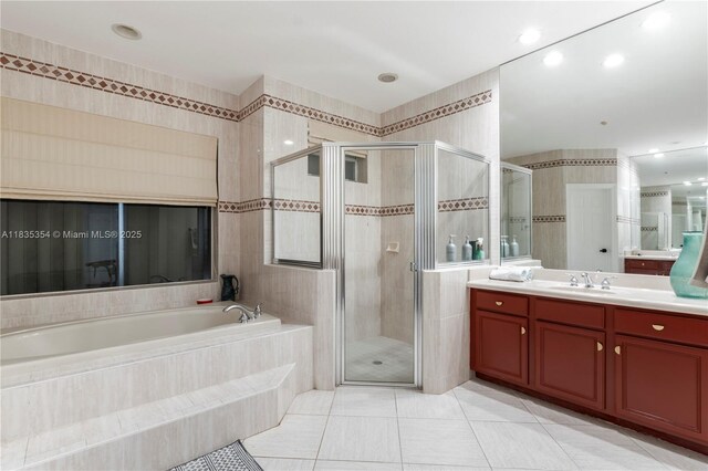 12530 SW 96th Ct, Miami, FL 33176 - bathroom featuring a bath, vanity, a stall shower, tile patterned floors, and recessed lighting