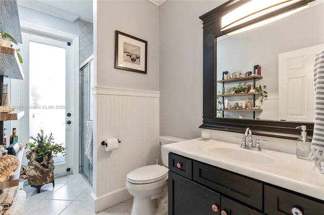 12530 SW 96th Ct, Miami, FL 33176 - full bathroom with vanity, a stall shower, tile patterned floors, and a wainscoted wall