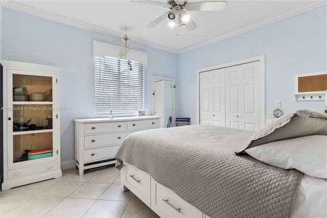 12530 SW 96th Ct, Miami, FL 33176 - bedroom with a closet, light tile patterned floors, ornamental molding, and a ceiling fan