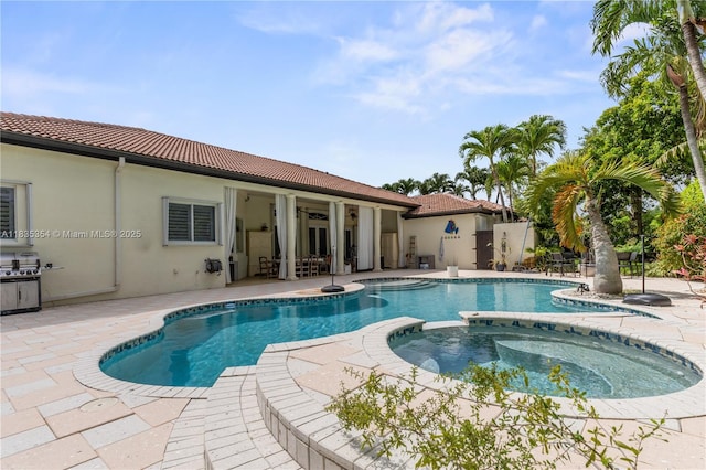 12530 SW 96th Ct, Miami, FL 33176 - view of swimming pool with a patio area and a pool with connected hot tub