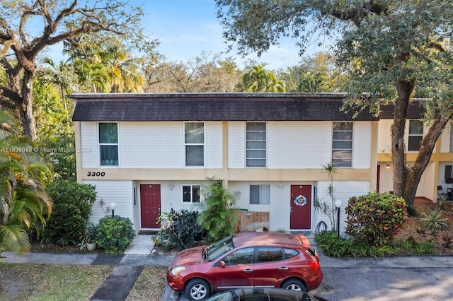 3300 Atlanta St, Hollywood, FL 33021 - multi unit property with mansard roof, roof with shingles, and stucco siding