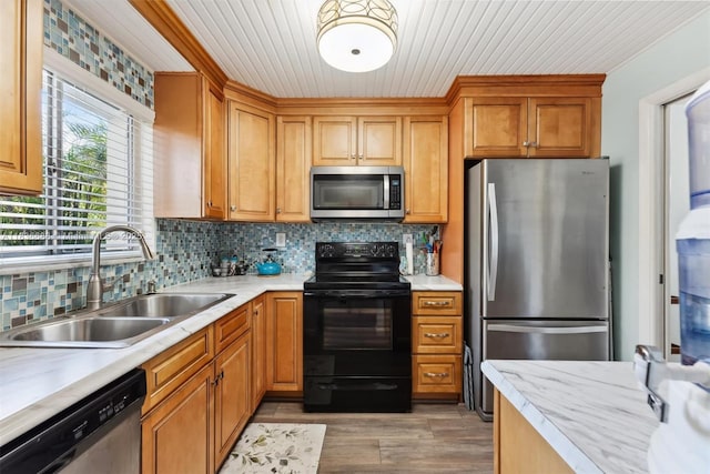 3300 Atlanta St, Hollywood, FL 33021 - kitchen with appliances with stainless steel finishes, light countertops, light wood-style floors, backsplash, and wood ceiling