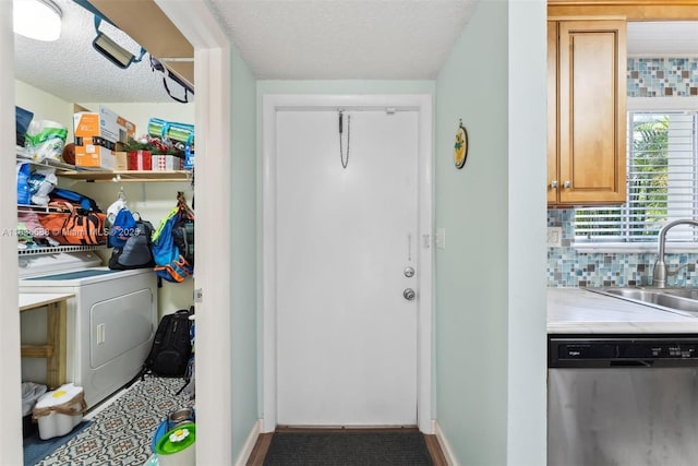3300 Atlanta St, Hollywood, FL 33021 - laundry room featuring washer / clothes dryer and a textured ceiling