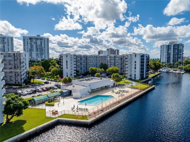 3401 N Country Club Dr Unit 308, Aventura, FL 33180 - view of swimming pool featuring a water view, a view of city, and a patio area