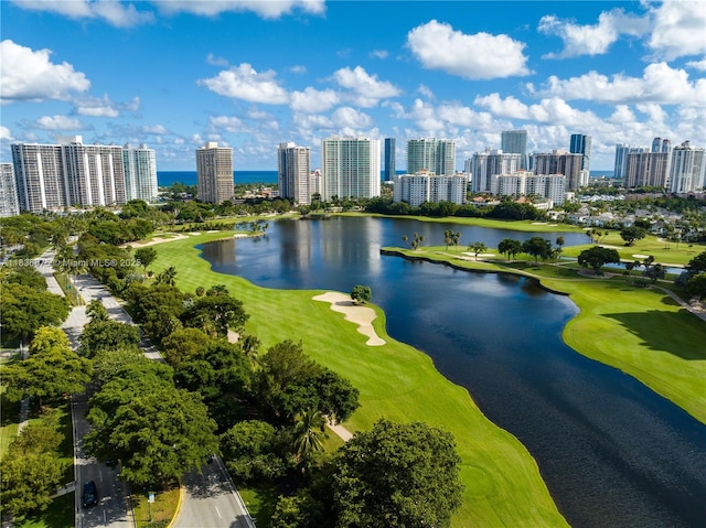 3401 N Country Club Dr Unit 308, Aventura, FL 33180 - drone / aerial view of a large body of water, a local golf course, and skyline
