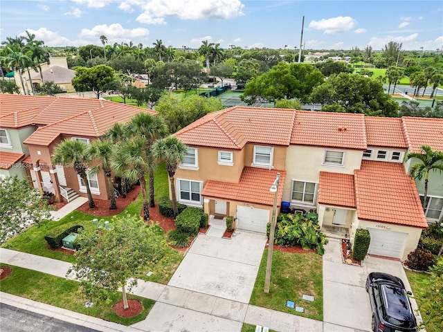 15107 NW 8th St, Pembroke Pines, FL 33028 - view of front facade with concrete driveway, a garage, stucco siding, and a tiled roof