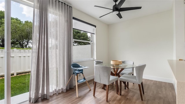 15107 NW 8th St, Pembroke Pines, FL 33028 - dining room with ceiling fan and wood finished floors