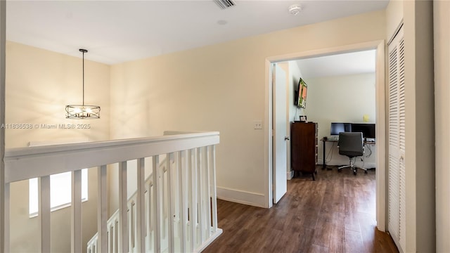 15107 NW 8th St, Pembroke Pines, FL 33028 - corridor with dark wood-style floors and a desk