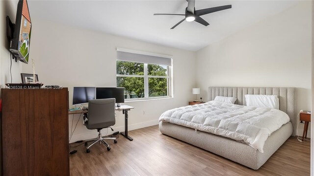 15107 NW 8th St, Pembroke Pines, FL 33028 - bedroom with wood finished floors, a desk, ceiling fan, and lofted ceiling