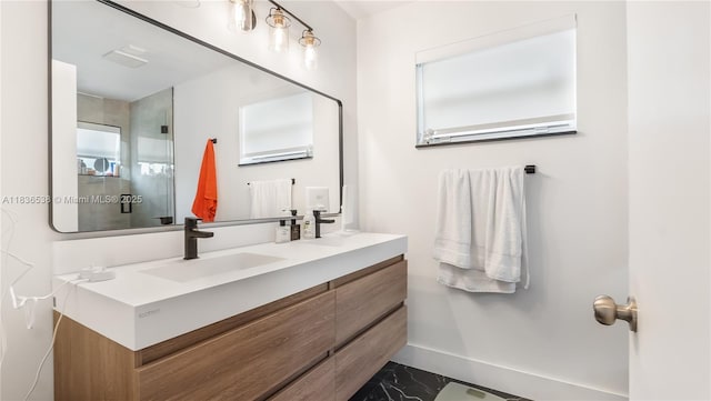 15107 NW 8th St, Pembroke Pines, FL 33028 - bathroom featuring double vanity and marble look tile flooring
