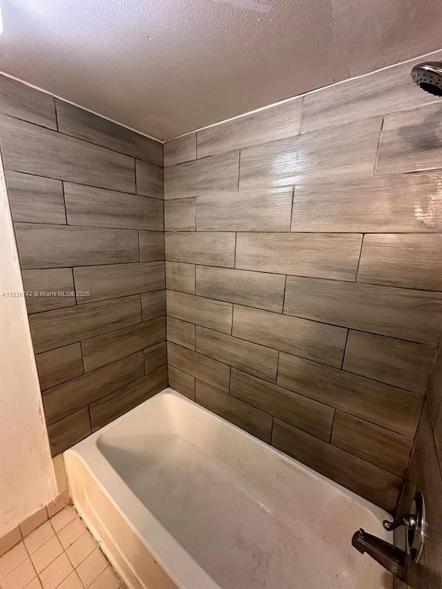 7110 NW 179th St Unit 110, Hialeah, FL 33015 - bathroom featuring tile patterned flooring and a textured ceiling