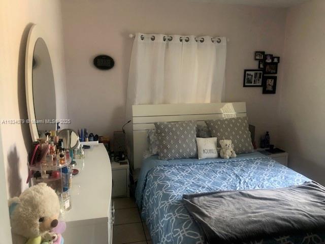 3600 SW 9th Ter Unit 1B, Miami, FL 33135 - bedroom featuring tile patterned flooring