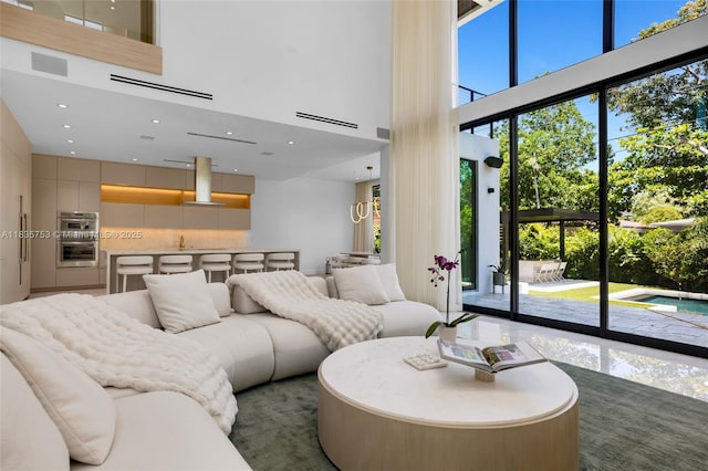 1351 SW 16th St, Miami, FL 33145 - living room featuring a high ceiling and recessed lighting