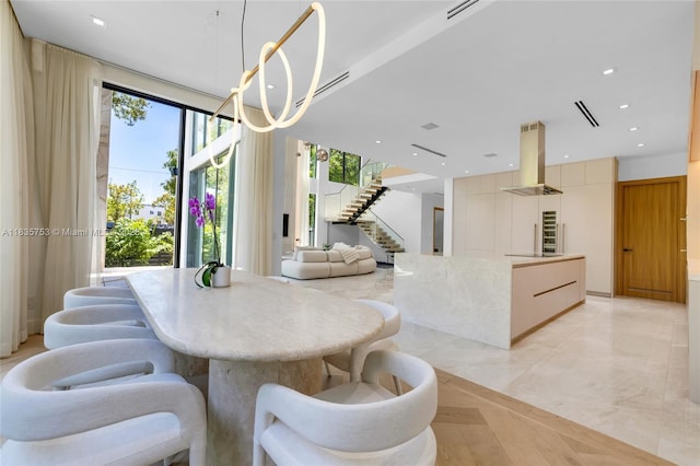 1351 SW 16th St, Miami, FL 33145 - dining room with stairway, plenty of natural light, a chandelier, and recessed lighting