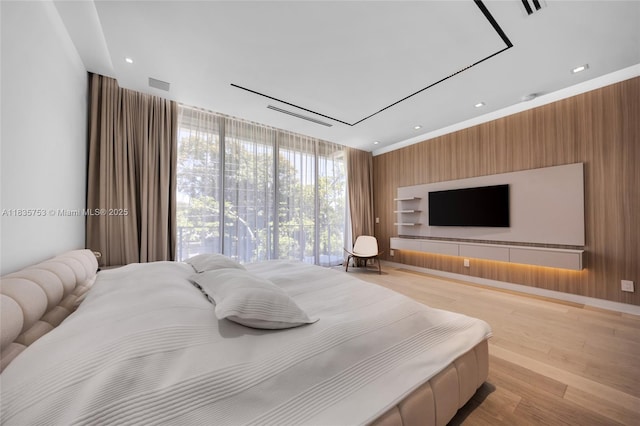 1351 SW 16th St, Miami, FL 33145 - bedroom with wood finished floors, wood walls, and recessed lighting