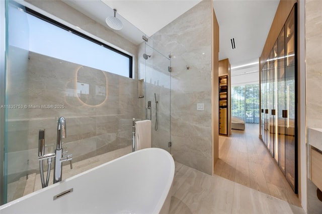 1351 SW 16th St, Miami, FL 33145 - bathroom featuring plenty of natural light, a stall shower, and a soaking tub
