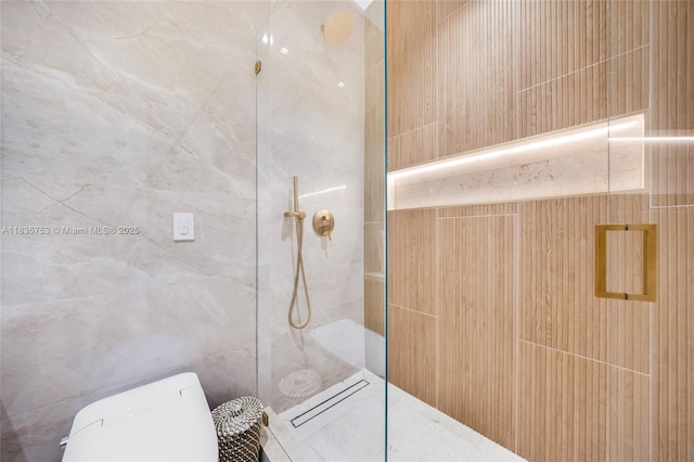 1351 SW 16th St, Miami, FL 33145 - bathroom featuring a marble finish shower and tile walls