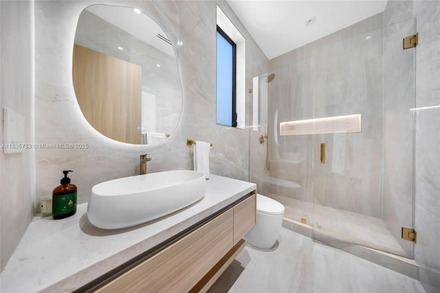 1351 SW 16th St, Miami, FL 33145 - full bath featuring tile walls, a shower stall, vanity, and marble tiled flooring