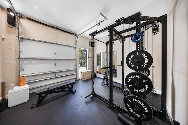 1351 SW 16th St, Miami, FL 33145 - workout room featuring a garage and baseboards