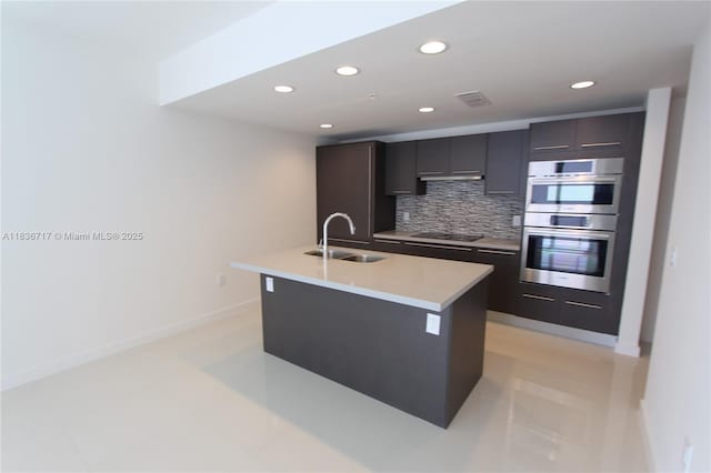 7875 NW 107th Ct Unit 519 4, Doral, FL 33178 - kitchen featuring double oven, decorative backsplash, light countertops, modern cabinets, and recessed lighting