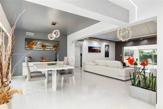 5712 White Hickory Cir, Tamarac, FL 33319 - dining room with a chandelier and light tile patterned floors