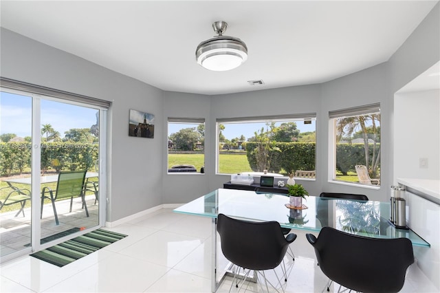 5712 White Hickory Cir, Tamarac, FL 33319 - dining room with plenty of natural light and light tile patterned floors