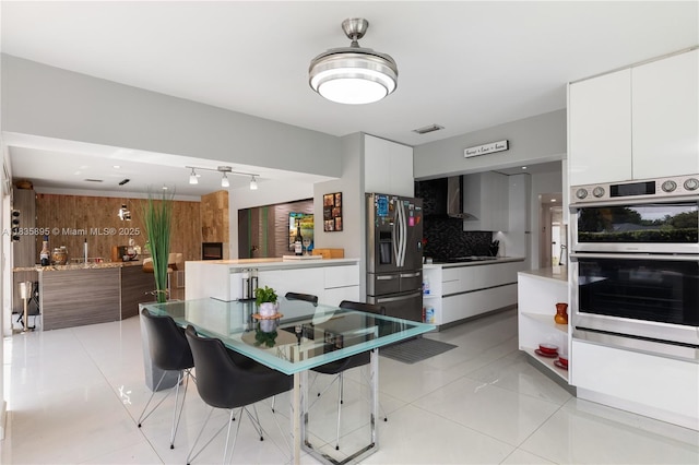 5712 White Hickory Cir, Tamarac, FL 33319 - dining area featuring light tile patterned floors