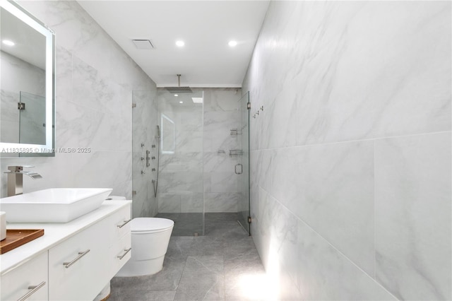 5712 White Hickory Cir, Tamarac, FL 33319 - full bathroom with tile walls, a marble finish shower, vanity, recessed lighting, and tile patterned flooring