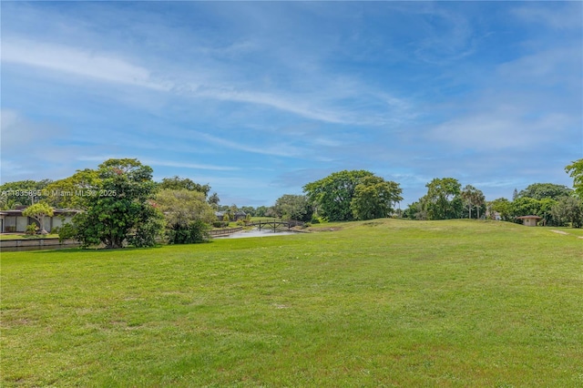5712 White Hickory Cir, Tamarac, FL 33319 - view of grassy yard with a water view