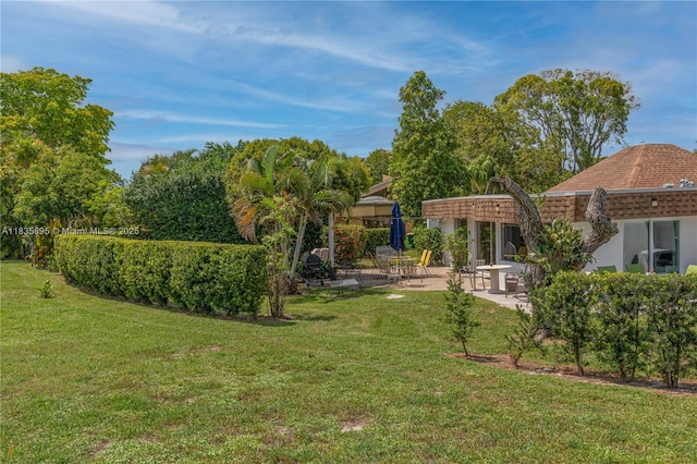 5712 White Hickory Cir, Tamarac, FL 33319 - view of green lawn featuring a patio