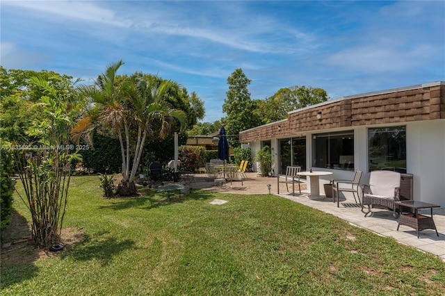 5712 White Hickory Cir, Tamarac, FL 33319 - view of green lawn featuring a patio