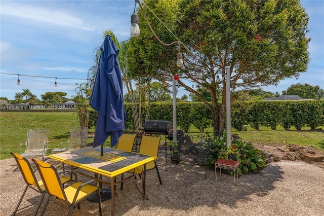 5712 White Hickory Cir, Tamarac, FL 33319 - view of patio / terrace featuring outdoor dining space and a grill