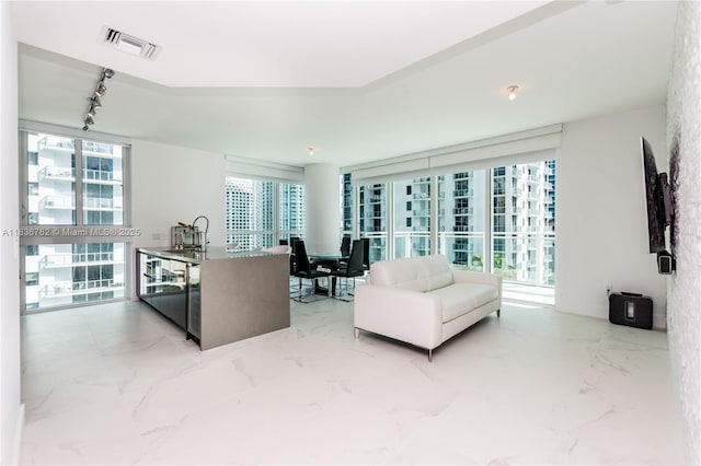 1080 Brickell Ave Unit 1708, Miami, FL 33131 - living area featuring track lighting and marble finish flooring
