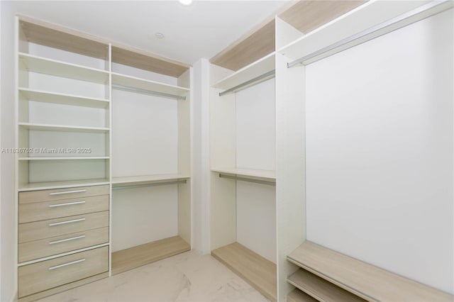 1080 Brickell Ave Unit 1708, Miami, FL 33131 - spacious closet with light marble finish floors