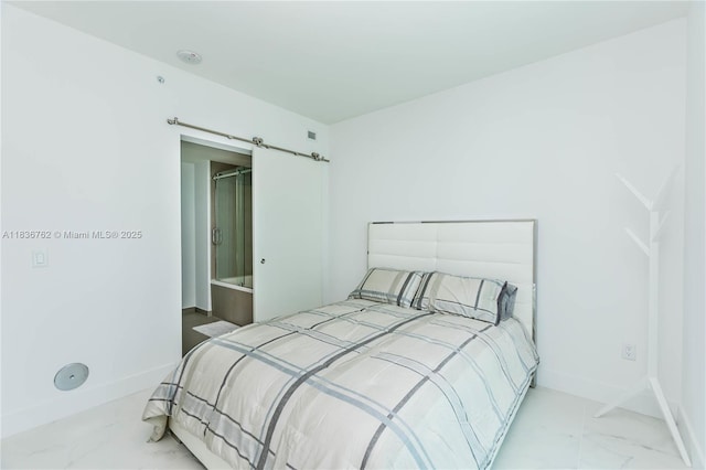 1080 Brickell Ave Unit 1708, Miami, FL 33131 - bedroom featuring marble look tiles and a barn door