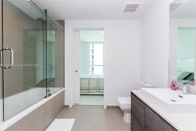 1080 Brickell Ave Unit 1708, Miami, FL 33131 - bathroom with vanity, bath / shower combo with glass door, and ensuite bath