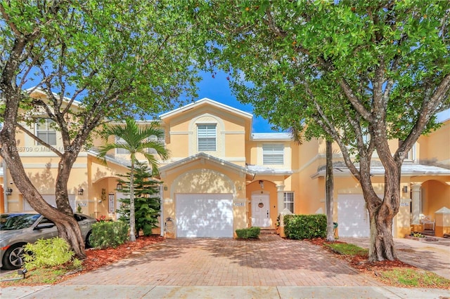 12548 SW 126th Ave, Miami, FL 33186 - multi unit property featuring stucco siding, a garage, and decorative driveway