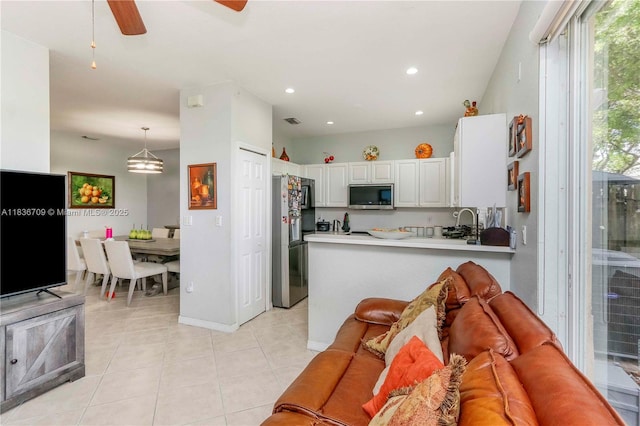 12548 SW 126th Ave, Miami, FL 33186 - living room featuring light tile patterned floors, a ceiling fan, and recessed lighting
