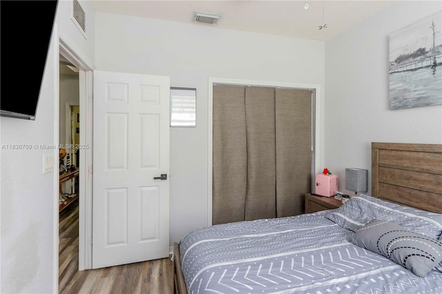 12548 SW 126th Ave, Miami, FL 33186 - bedroom with wood finished floors and a closet