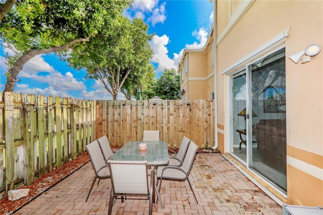 12548 SW 126th Ave, Miami, FL 33186 - fenced backyard with outdoor dining space and a patio