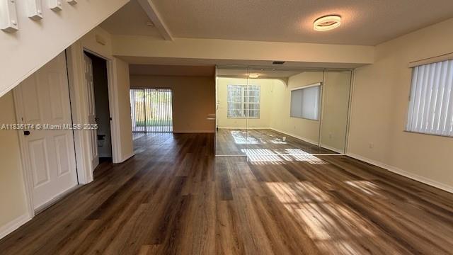 628 Turtle Run, Weston, FL 33326 - unfurnished room with wood finished floors and baseboards