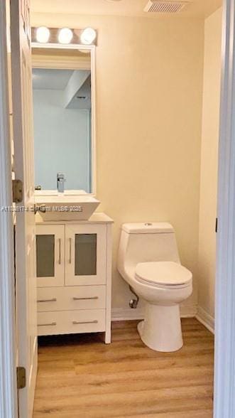 628 Turtle Run, Weston, FL 33326 - half bathroom with wood finished floors and vanity