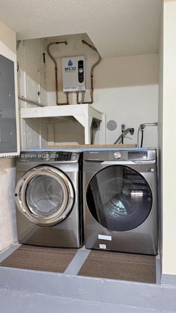 628 Turtle Run, Weston, FL 33326 - laundry area with separate washer and dryer, electric panel, and a textured ceiling