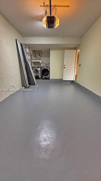 628 Turtle Run, Weston, FL 33326 - garage with a garage door opener and washer and dryer