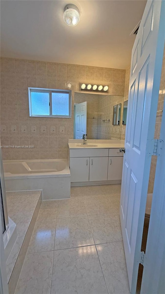 628 Turtle Run, Weston, FL 33326 - bathroom with a bath, double vanity, and tile patterned floors