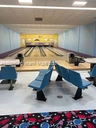 628 Turtle Run, Weston, FL 33326 - game room with a bowling alley