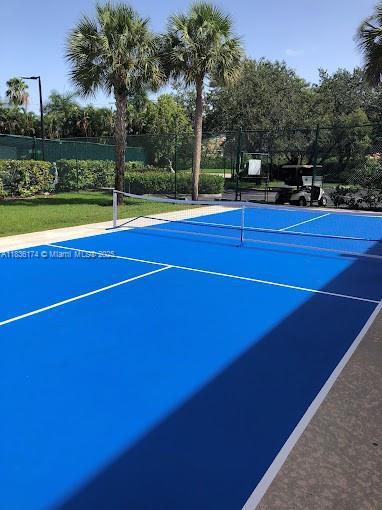 628 Turtle Run, Weston, FL 33326 - view of tennis court with community basketball court