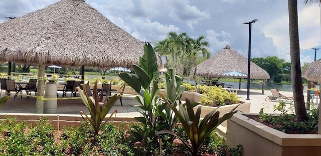 628 Turtle Run, Weston, FL 33326 - view of property's community with a gazebo and a patio area