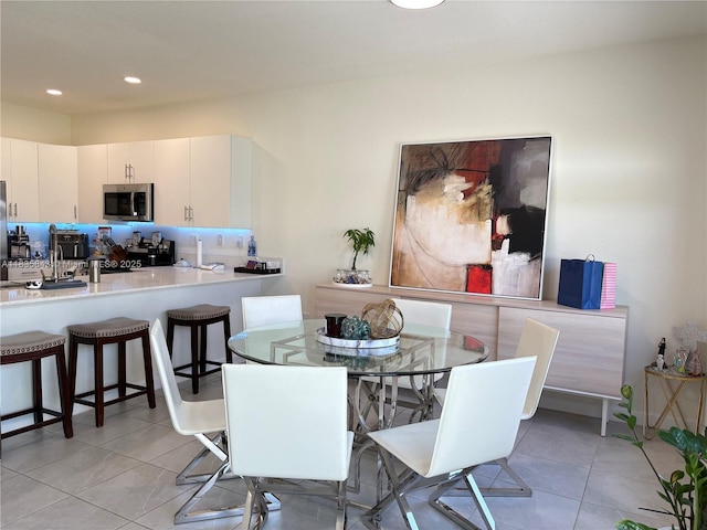 3482 114th Ter, Hialeah, FL 33018 - dining room featuring light tile patterned flooring and recessed lighting