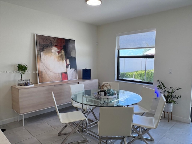 3482 114th Ter, Hialeah, FL 33018 - tiled dining space featuring baseboards
